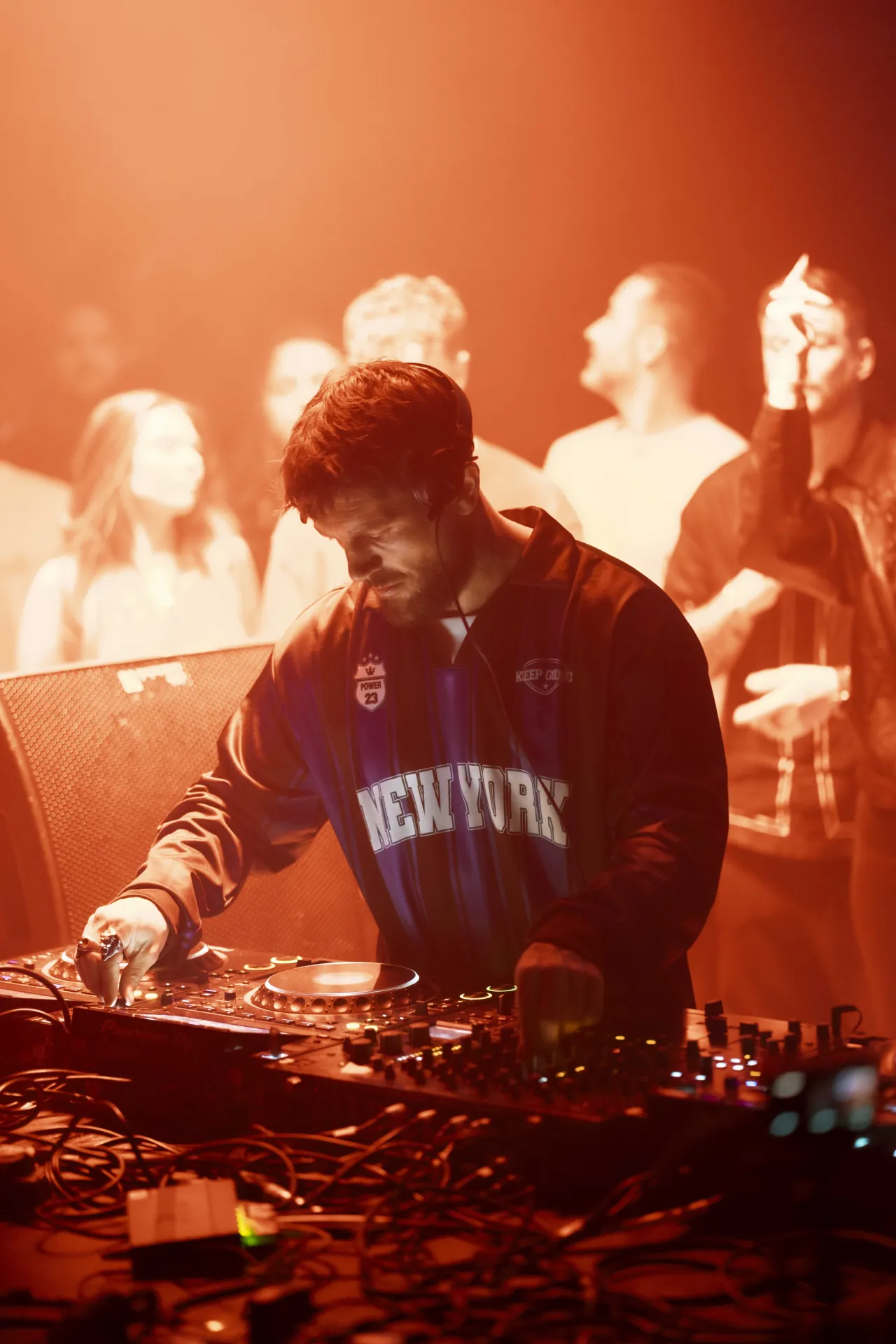 Musicians playing live at a concert, engaging with the audience and delivering an electrifying performance.