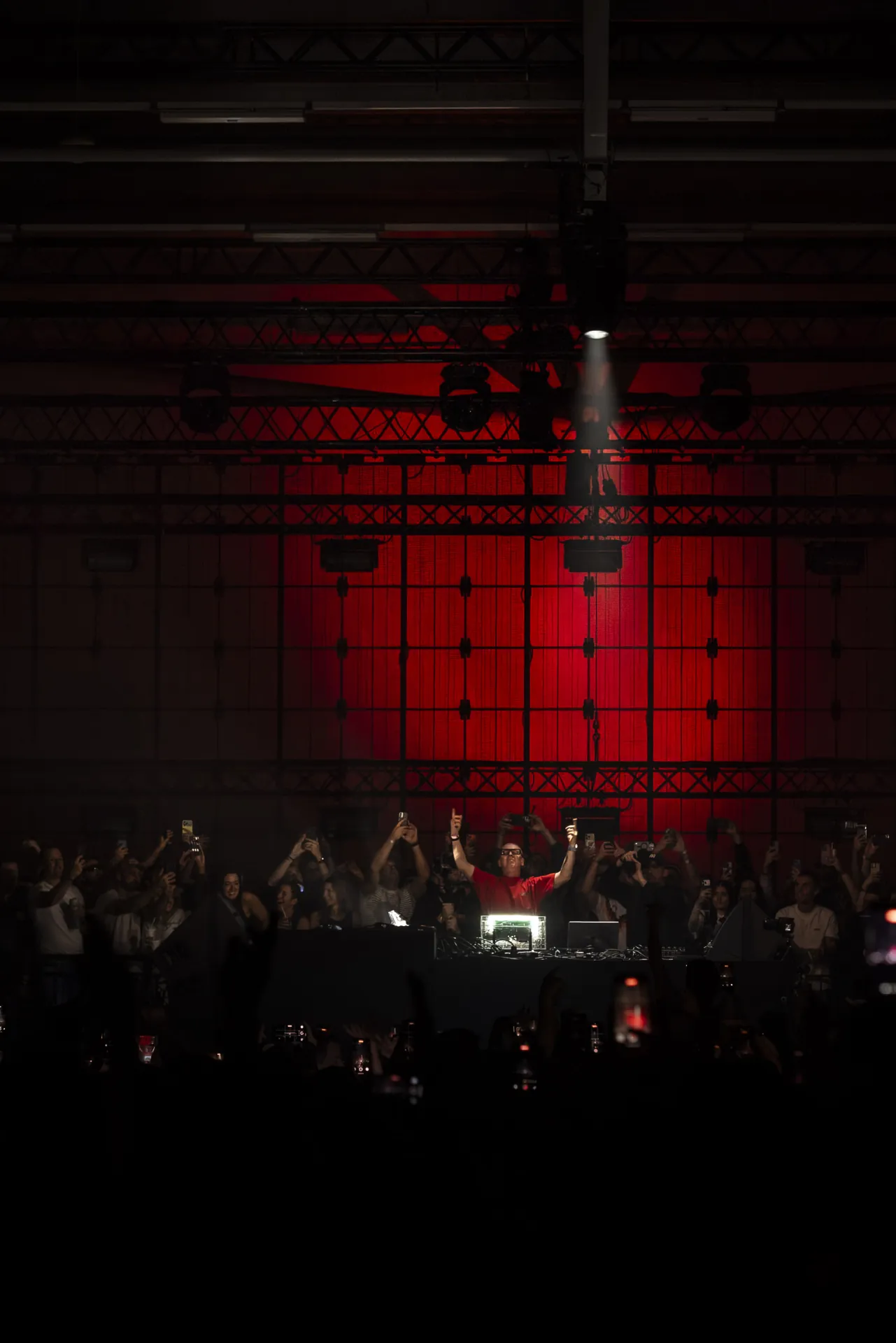 Musicians playing live at a concert, engaging with the audience and delivering an electrifying performance