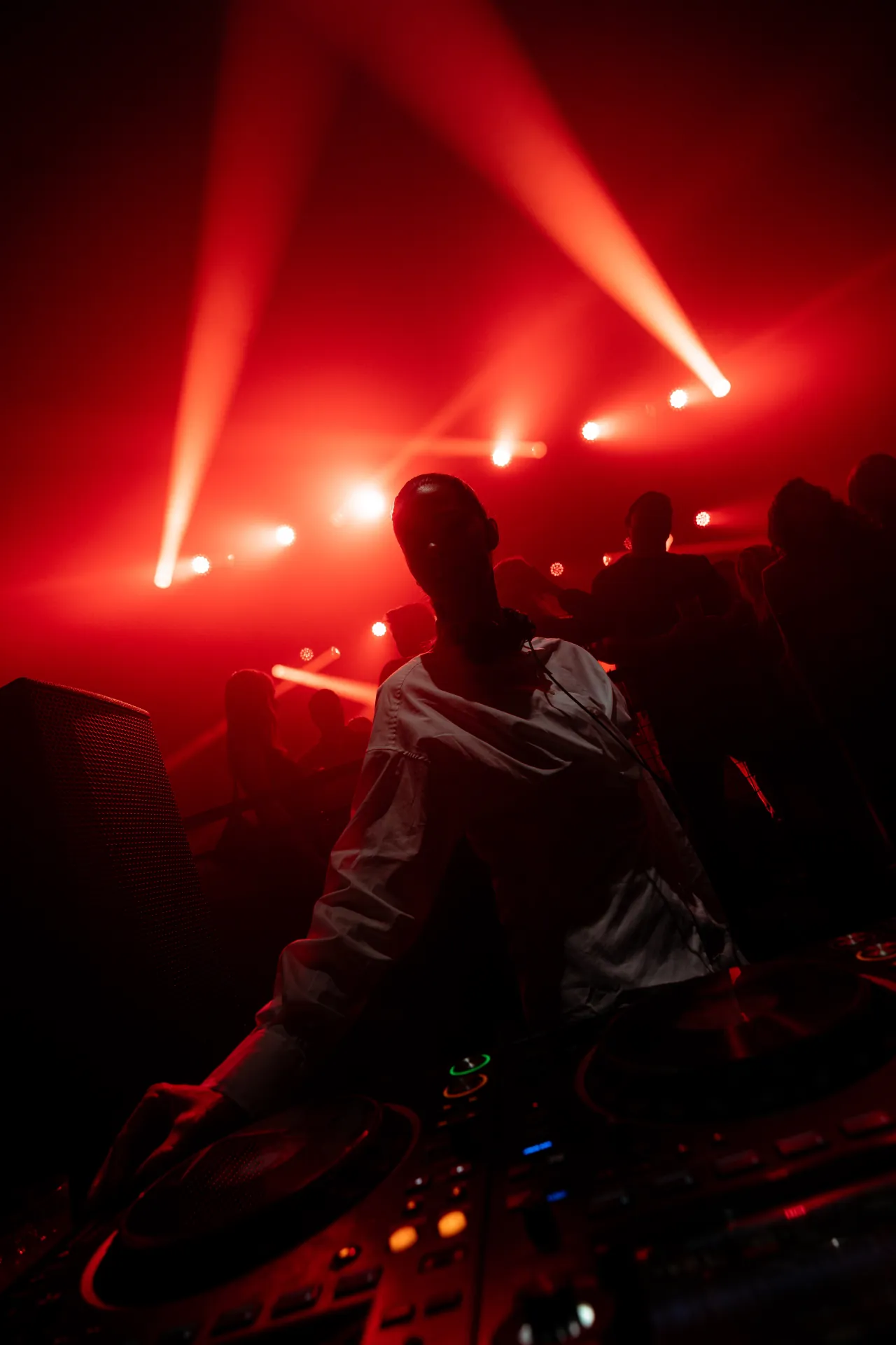 Musicians playing live at a concert, engaging with the audience and delivering an electrifying performance.