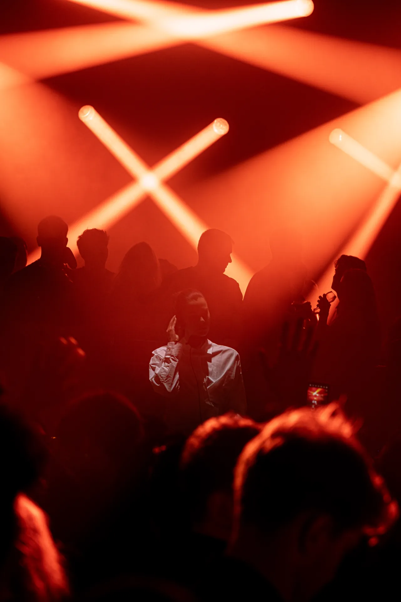 Musicians playing live at a concert, engaging with the audience and delivering an electrifying performance.